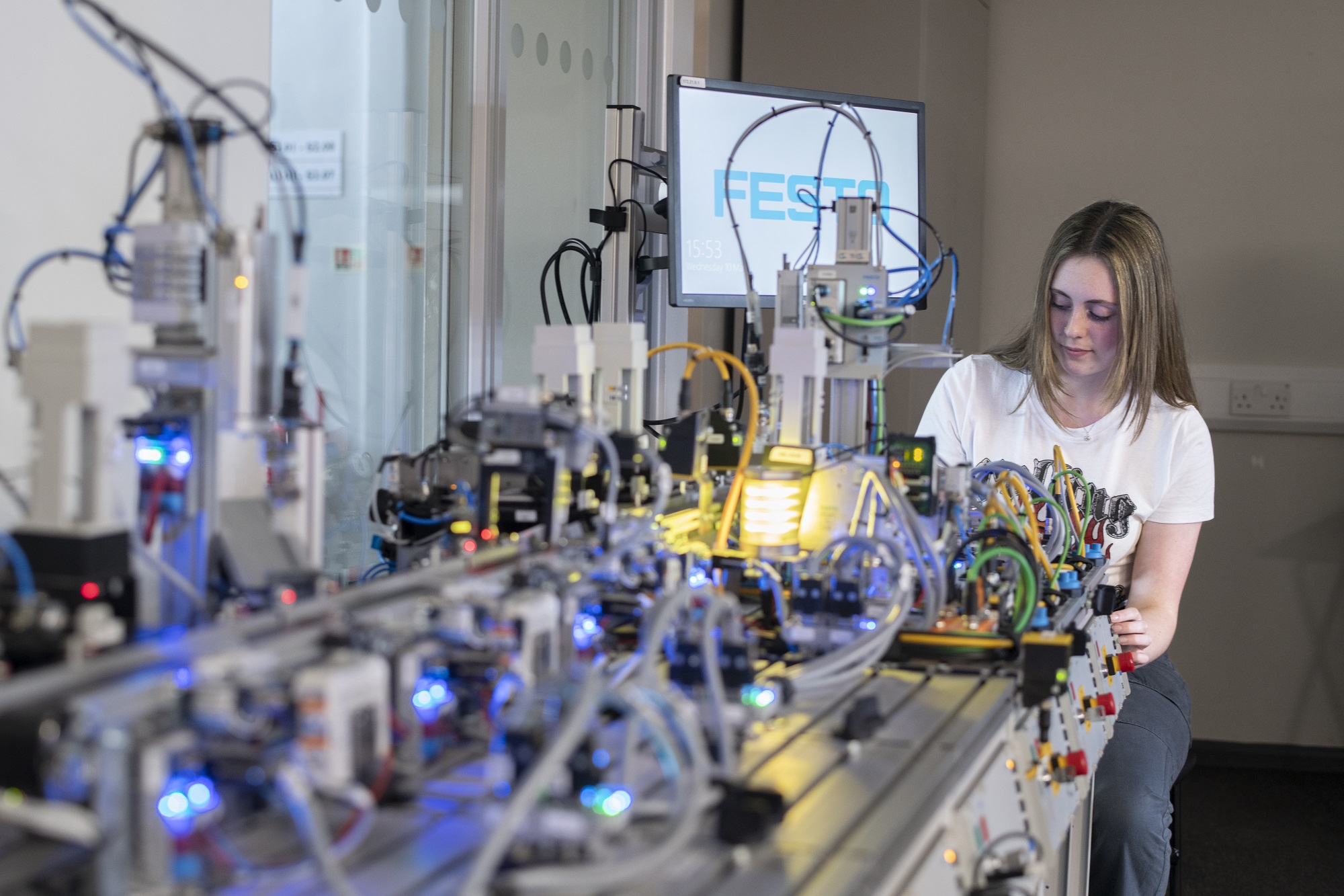 A 16-18 student working in a science lab