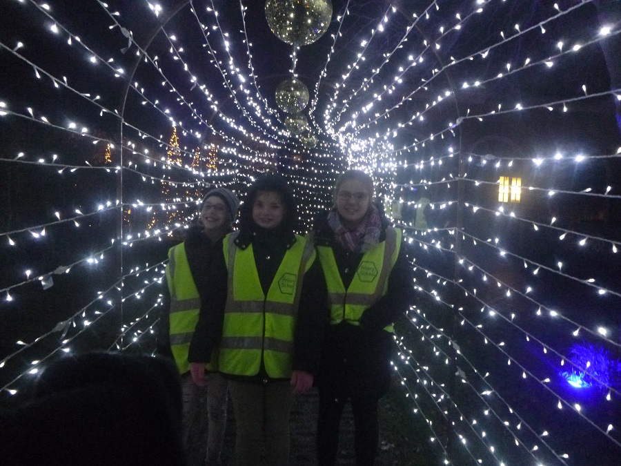 SEND students with Christmas fairy lights around them